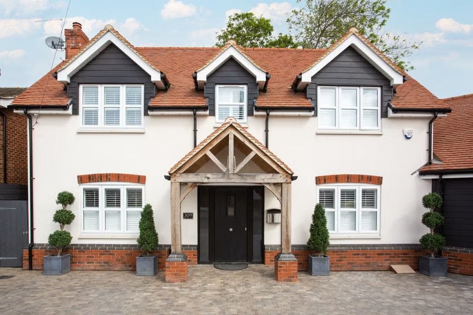 Semi-detached house with driveway and front steps on Daisy Farm Road in Birmingham